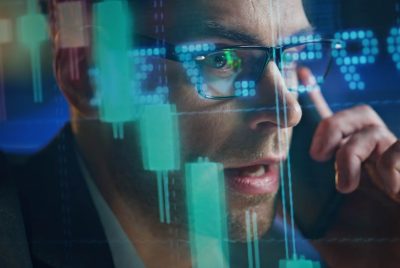 Finance manager talking smartphone in sales hologram closeup. Busy trader work discussing exchange stock market strategy on call. Focused forex analyst consulting client checking economic statistics
